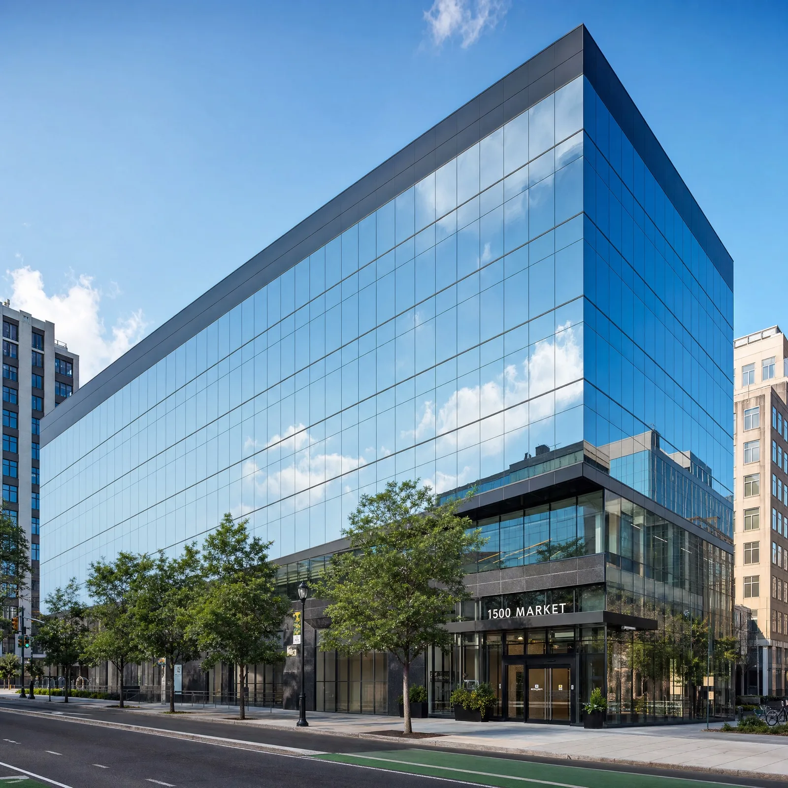 Philadelphia facade after refinishing — modernized glass Same Philadelphia commercial building facade restored with exterior refinishing film — modern, clean appearance