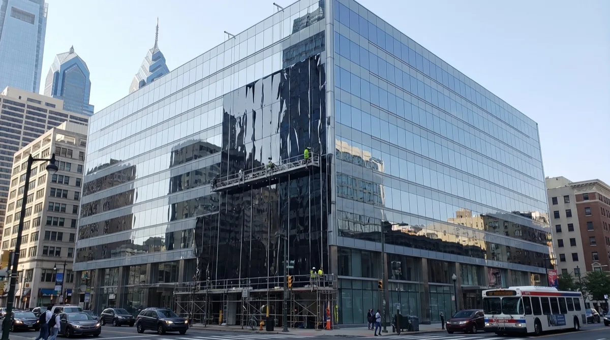 Modern commercial building facade restored with exterior refinishing film in Philadelphia